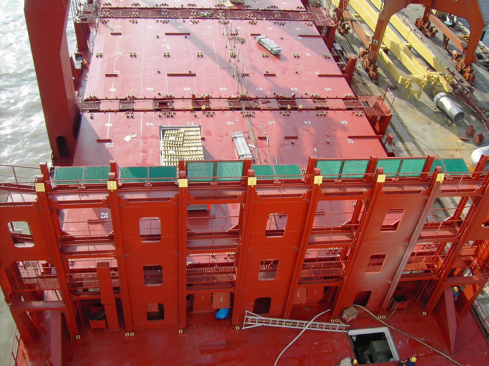 Cell guide systems on deck and in the hold